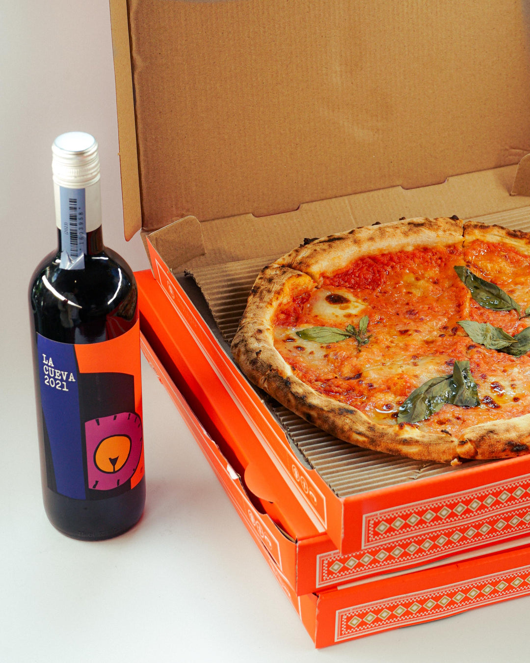 A Margherita Fior Di Latte Pizza & 1 Bottle of Red Wine - Bundle | Wine & Food - Buy online with Fyxx for delivery.
