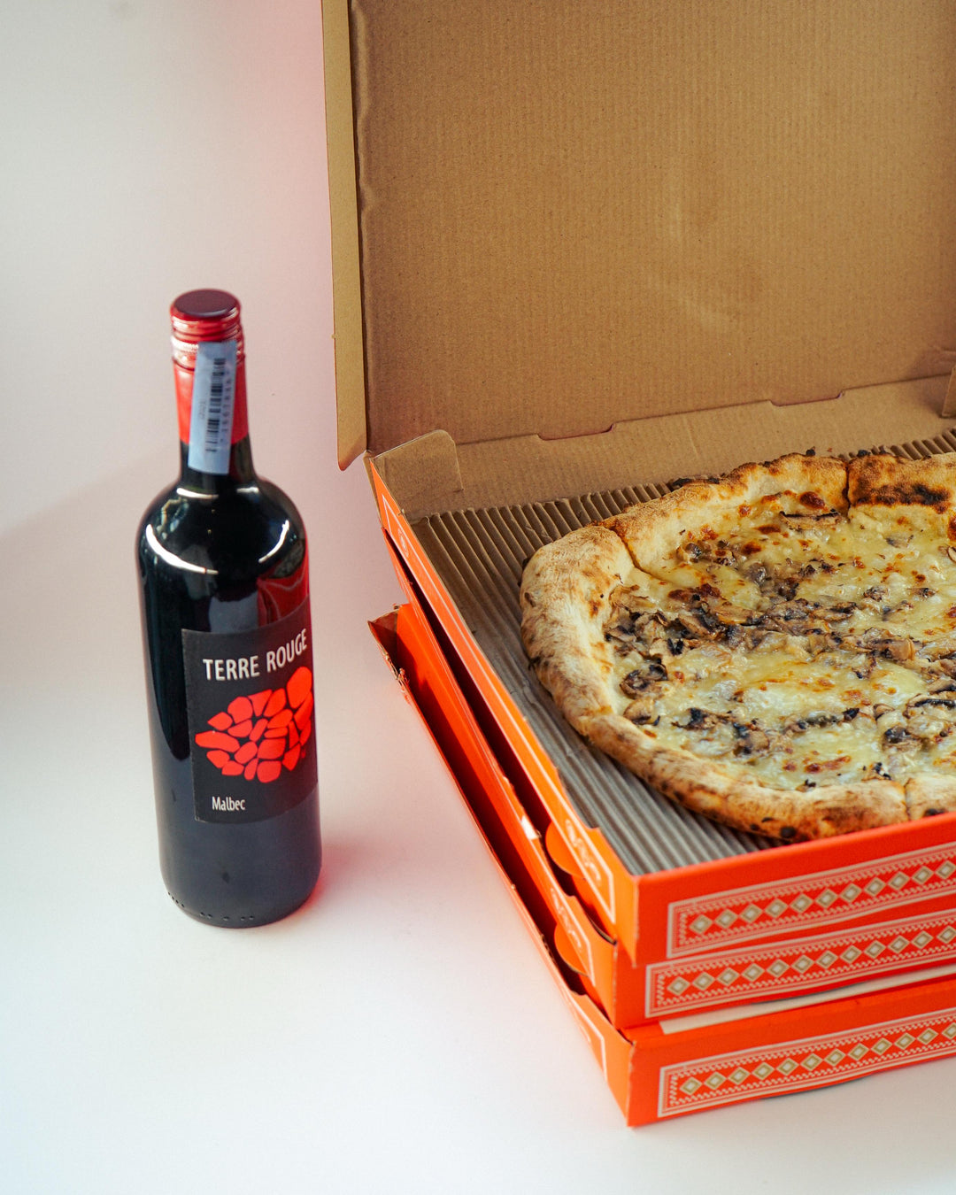 A Funghi E Parmigiano Pizza & 1 Bottle of Malbec - Bundle | Wine & Food - Buy online with Fyxx for delivery.